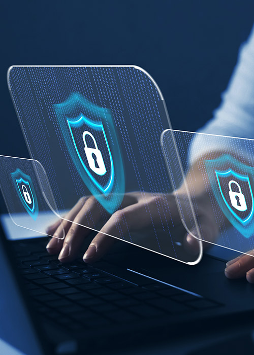 a woman using her laptop with three icons displaying virtual locks for security.